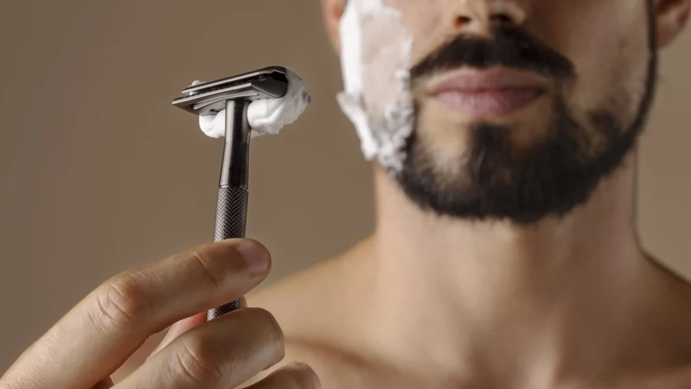 man holding razor