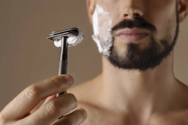 man holding razor